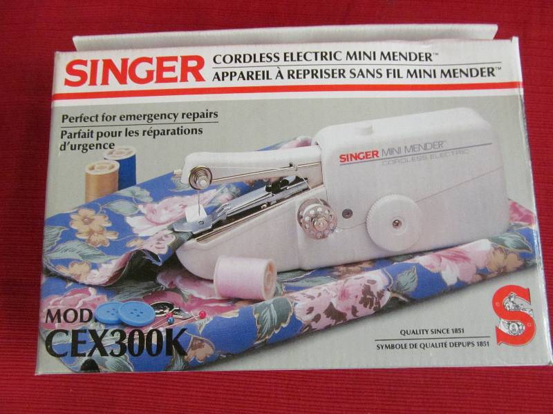 lot 75 image: Singer Mini Mender