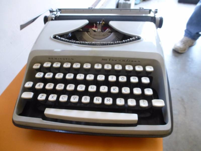 lot 37 image: Antique Remington Typewriter & Cane