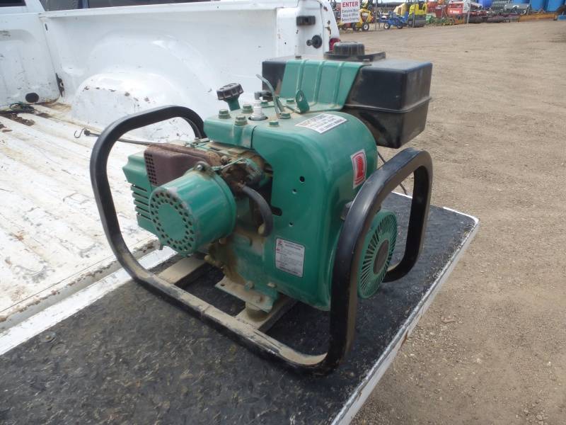 lot 9 image: Coleman Powermate Generator
