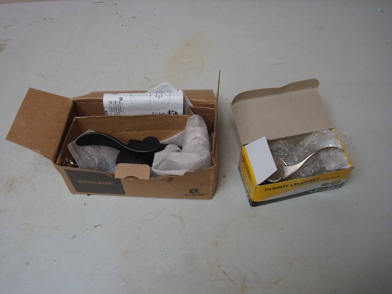 Pair On New Door Levers, One Is Schlage�