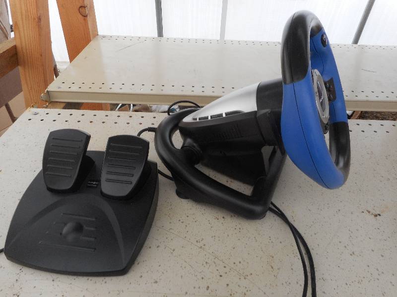 lot 34 image: PLAY ON STEERING WHEEL AND FOOT PEDDAL