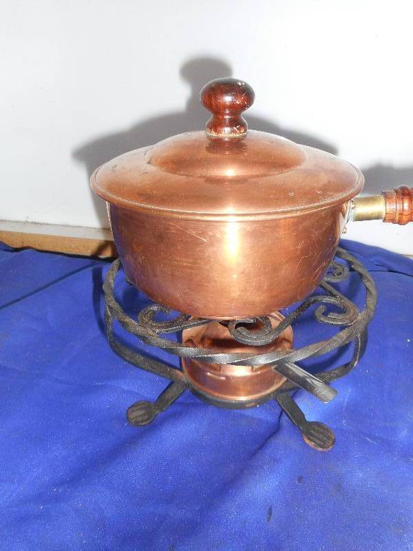 lot 73 image: ANTIQUE COPPER POT AND BURNWE ON CAST IRON STAND