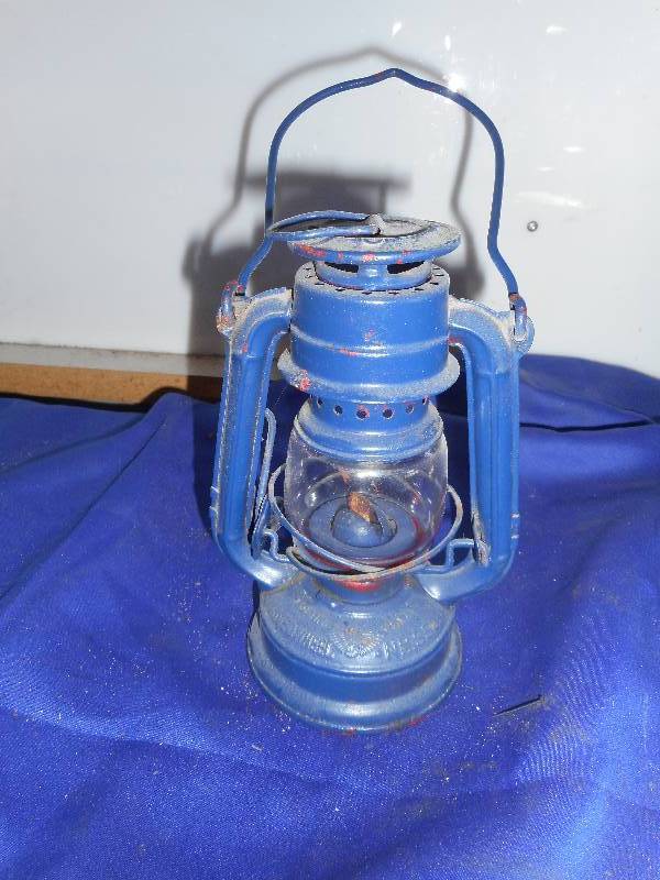 lot 80 image: VINTAGE WINGED WHEEL OIL LANTERN