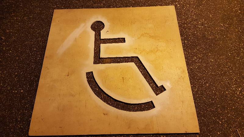 Handicapped sign marker