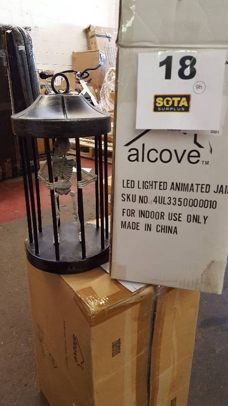 lot 18 image: LED Lighted Animated Jailed Skeleton