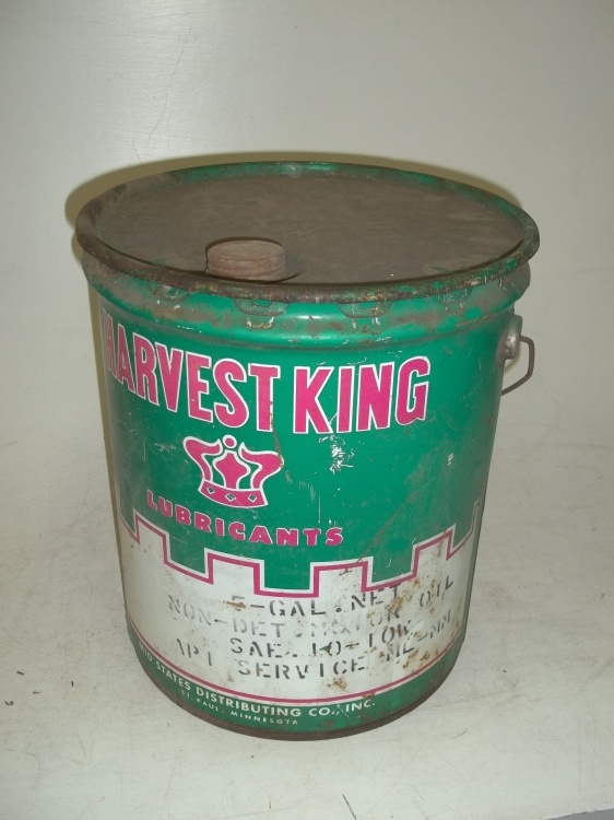 lot 27 image: 5 gallon Harvest King oil can has rust