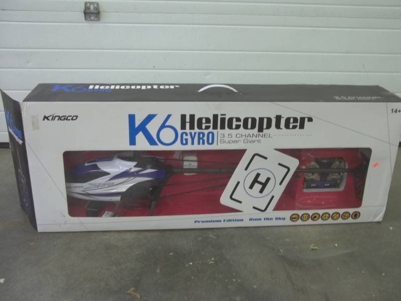 lot 32 image: Very large remote control helicopter needs power pack approx. 45 long