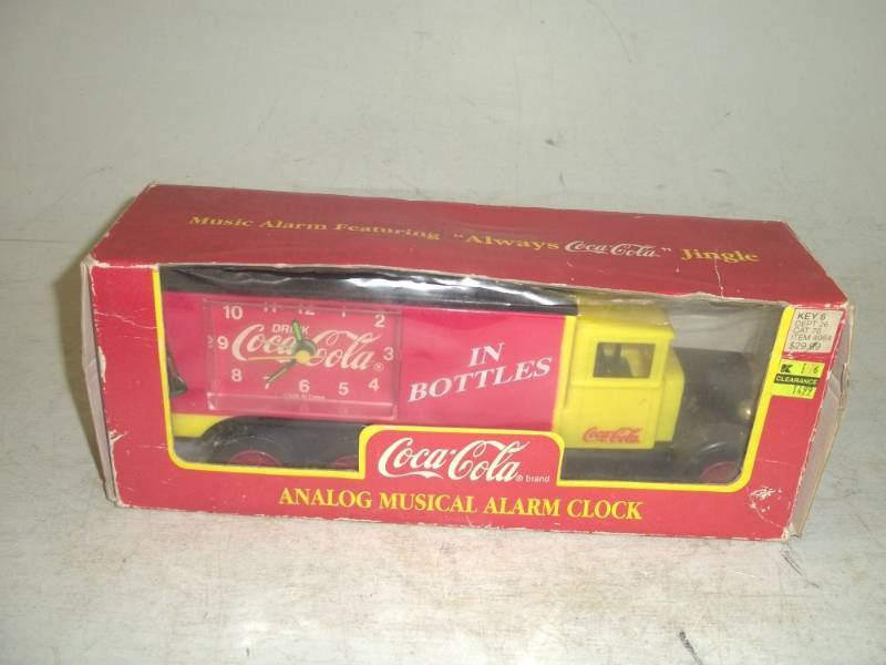 lot 69 image: Coca-Cola musical alarm clock truck still in box