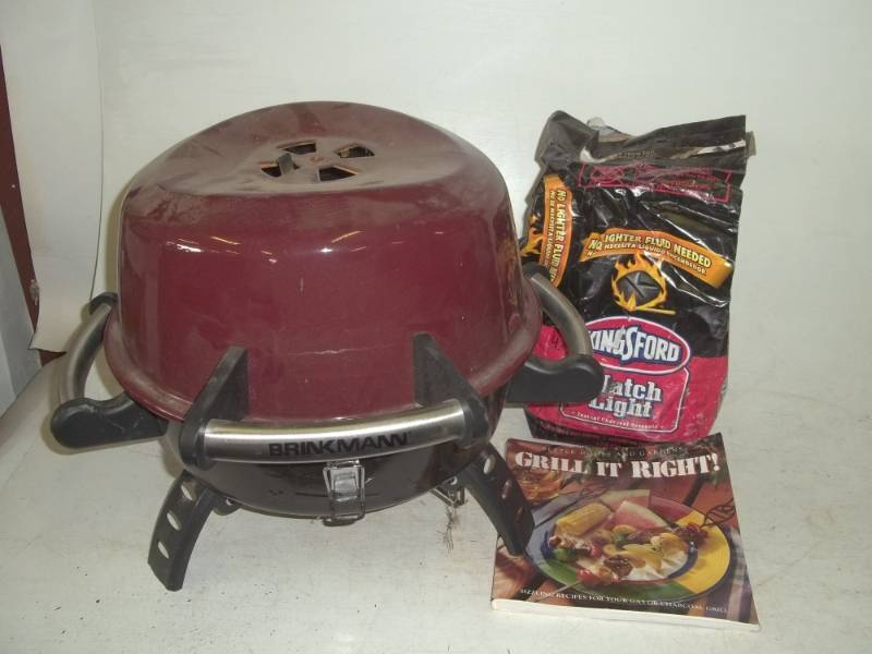 lot 82 image: Portable brinkman BBQ with grill book and charcoal