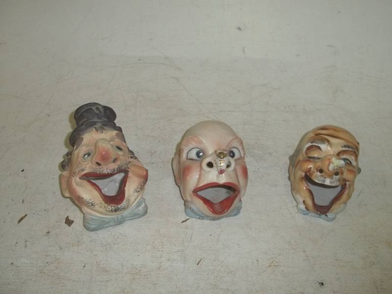 lot 88 image: 3 antique clown cigarette holdersash trays