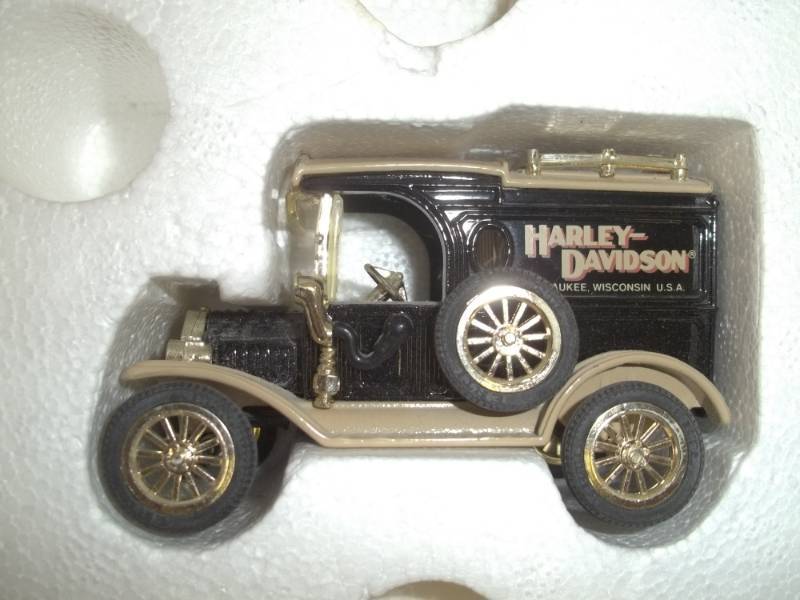 lot 120 image: Collectible Harley Davidson 1913 Ford Model T van dime bank