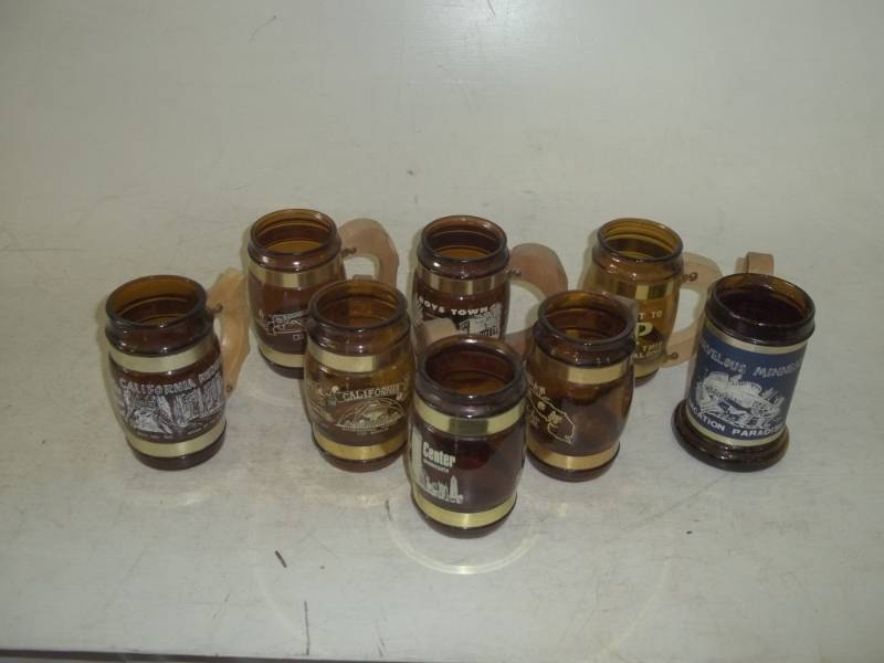 lot 124 image: 1960s travel souvenir beer mugs