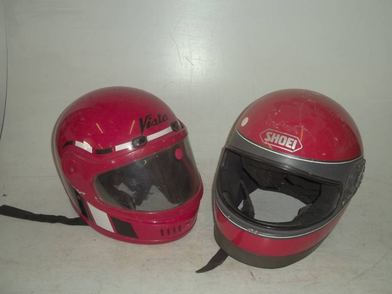 lot 138 image: 2 red helmets one size M other unknown