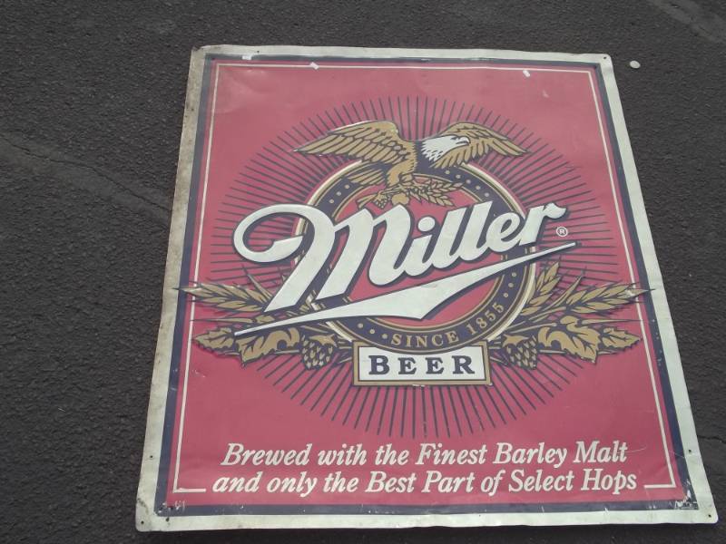 lot 166 image: Largwe tin Miller beer sign 36 x 40