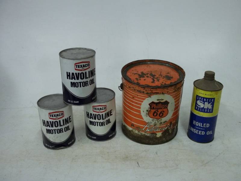 lot 182 image: Vintage oil cans, Phillips 66, havoline, havoline cans are full