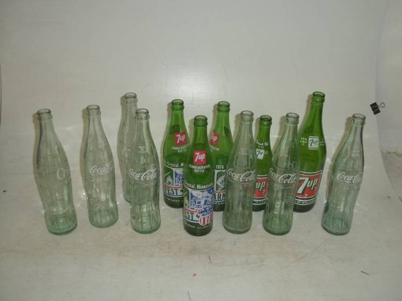 lot 195 image: 12 vintage Coke and 7-up bottles 1 from lake crystal Minnesota