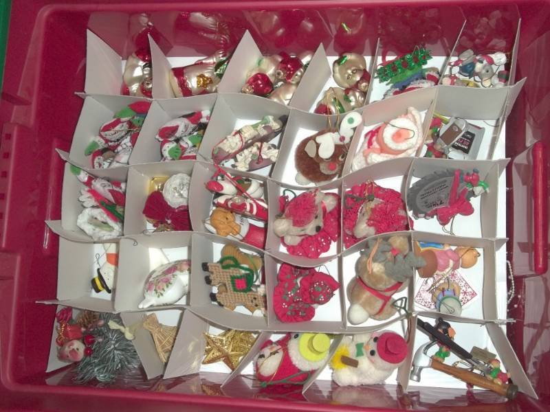 lot 210 image: Almost 100 Christmas ornaments with tub and 2 small Christmas trees