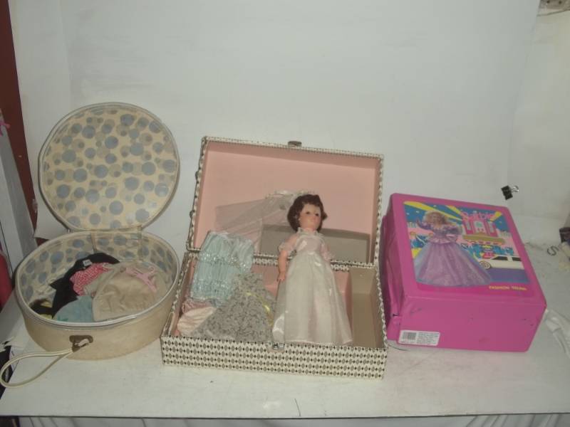 lot 220 image: Vintage doll Barbie clothes and doll cases