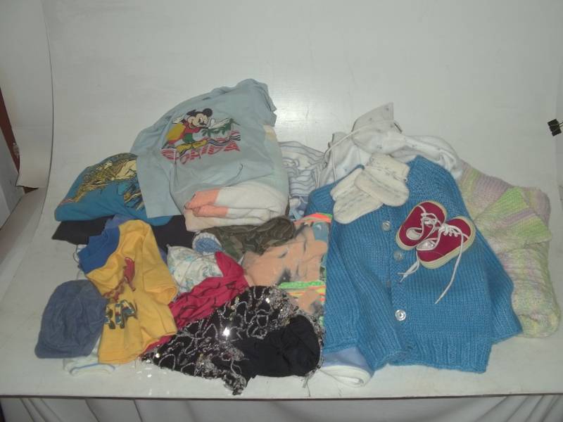 lot 256 image: Large collection of baby and childrens clothing and vintage baby blanket