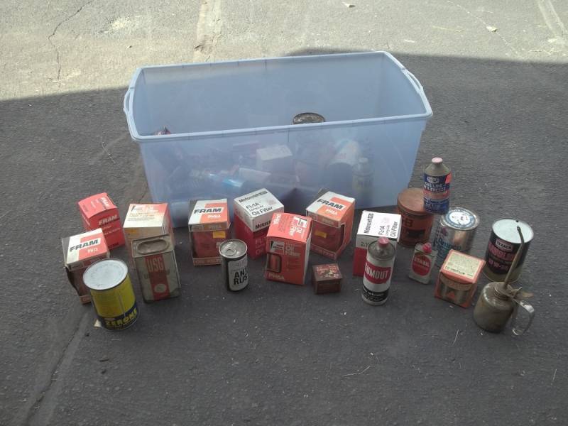 lot 276 image: auto garage supplies, full oil cans, filters, spark plugs