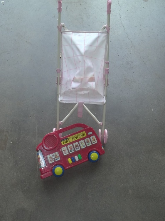 lot 278 image: Bus toy and folding doll stroller