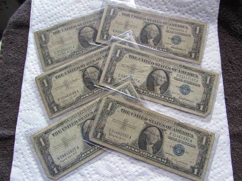 LOT OF 6 1957 SILVER CERTIFICATES...