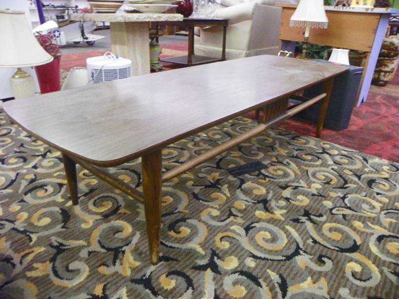 lot 84 image: older wooden coffee table