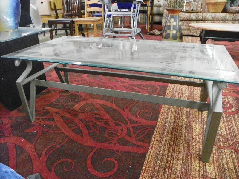 lot 109 image: glass top coffee table, very heavy