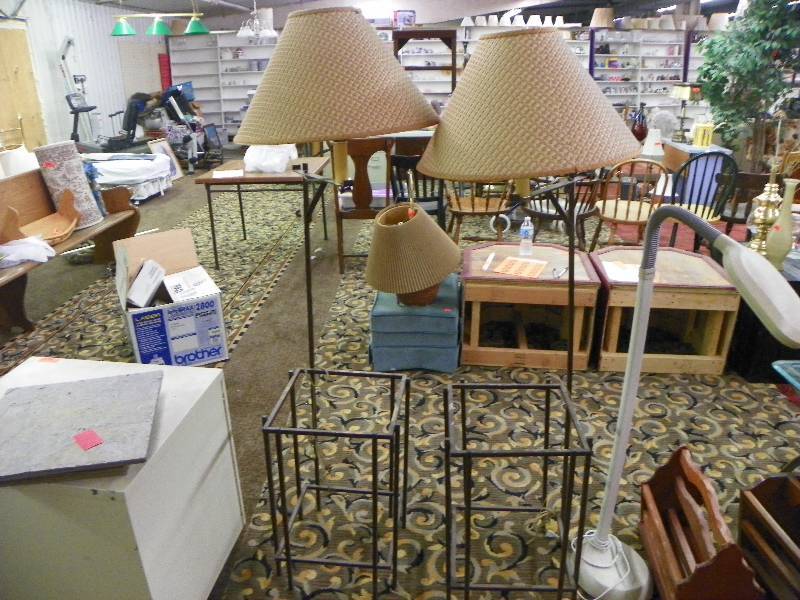 lot 124 image: pair of side table floor lamps, both are missing the table top piece.