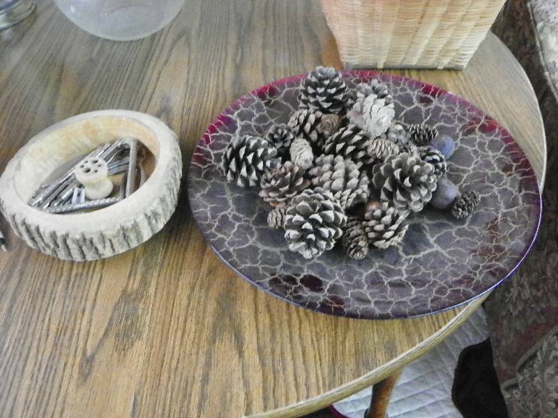 lot 130 image: decorative red glass plate with pine cones and nut cracker bowl and tools