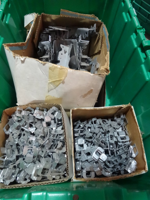 NEW Entire Bin incl. 1 box 58 plywood clips, 1 box 716 plywood clips, 1 box joist hangers and 1 box truss fasteners. Bin not included.