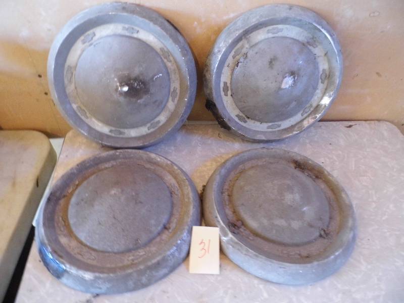 4 Chevy Hubcaps
