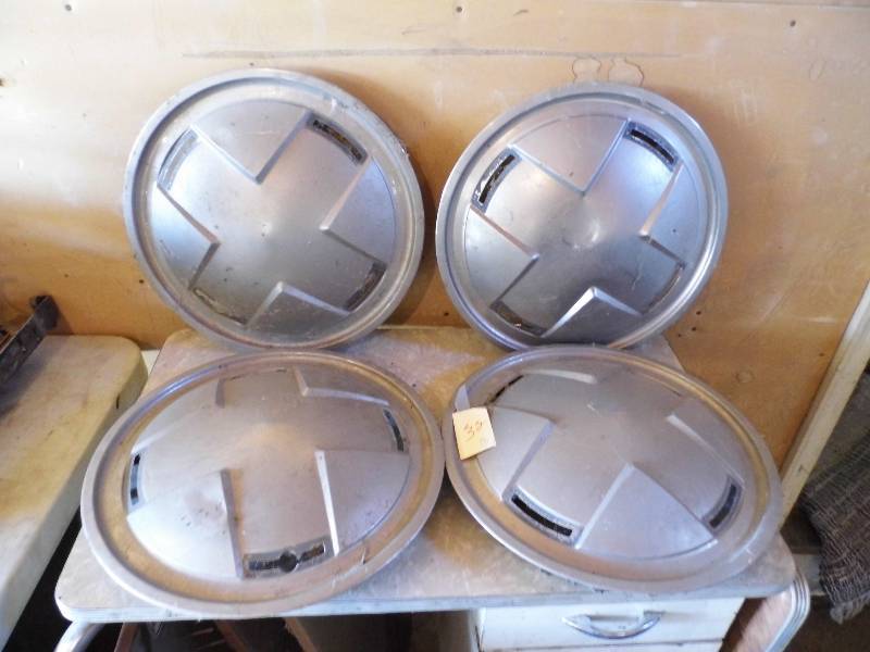 4 Chevy Hubcaps