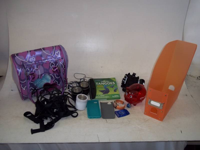 Piggy bank, clock, compass, dog harness and bag of stuffed animals