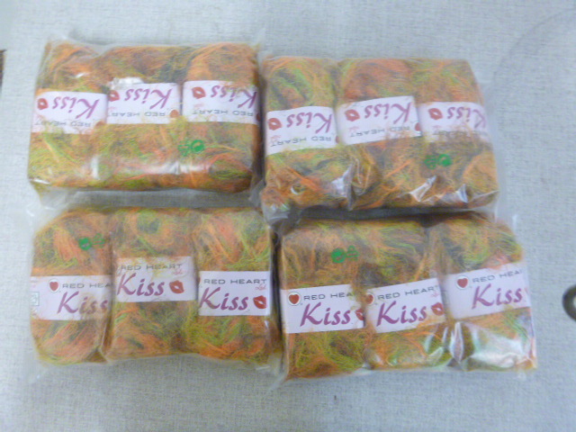 lot 134 image: 4 Packs of Kiss Red Heart Yarn
