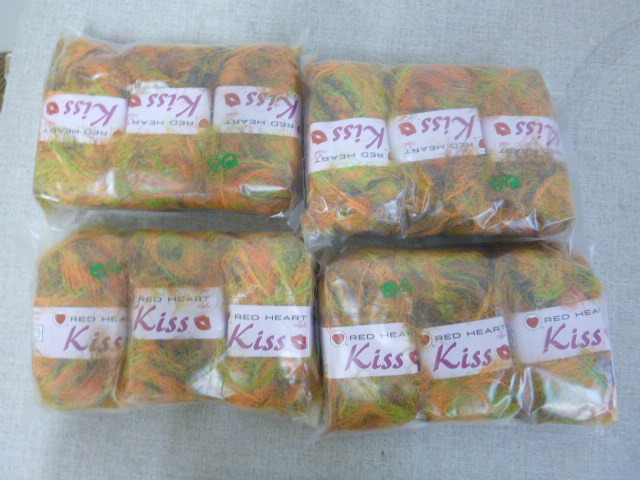 lot 136 image: 4 Packs of Kiss Red Heart Yarn