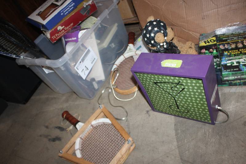 lot 74 image: Box Lot of Electronics Including Racquets, CSI Game, Kid Smart Smoke Alarm, Picture Viewer, Picture Album, And More