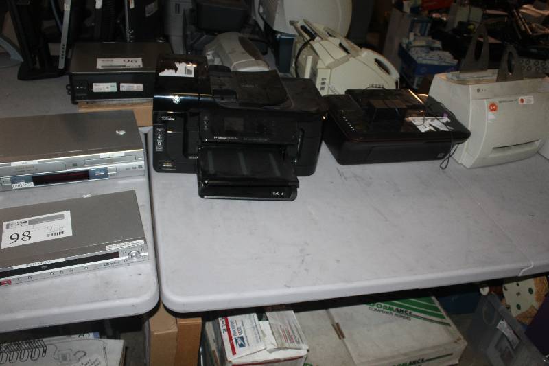 lot 98 image: Lot of (6) Electronics Including 4) HP Printers OfficeJet 5600A, DeskJet 3054, LaserJet 1200 Series, LaserJet 1100 AND 1) Panasonic NV-VP32 DVDVCR Player AND 1) Pioneer DV-393 DVD Player