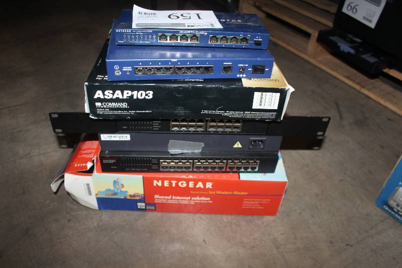 lot 159 image: Lot of (7) Electronics Including Netgear Switches, ASAP103 Command Center, And More