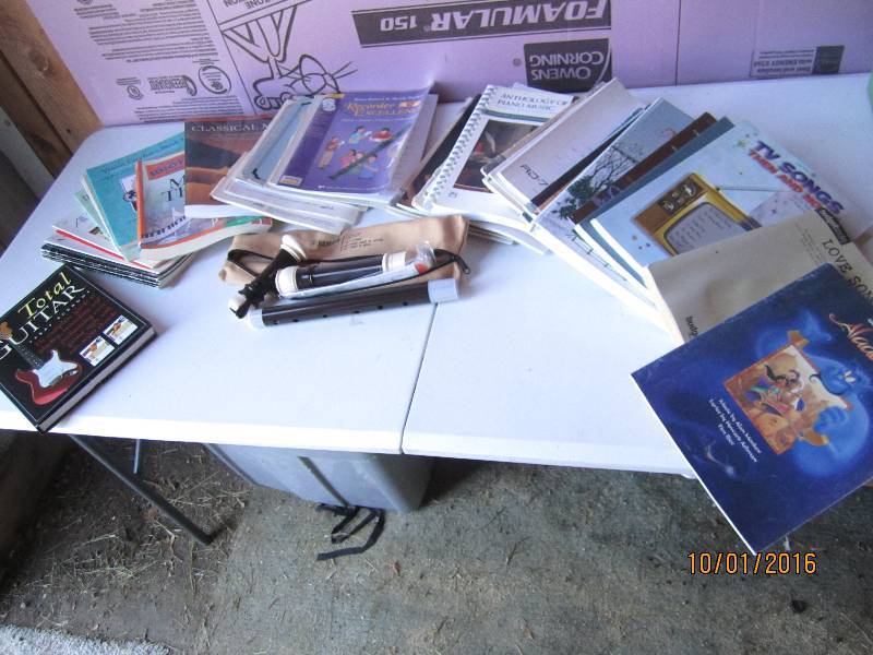 Lot of music books and a Yamaha YRT...