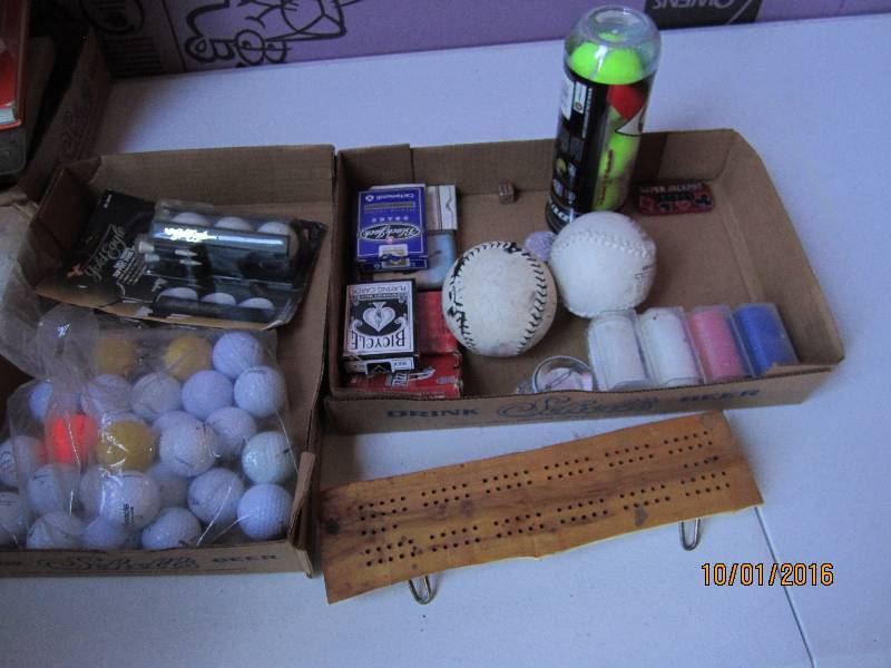 Lot of sports balls and equipment...