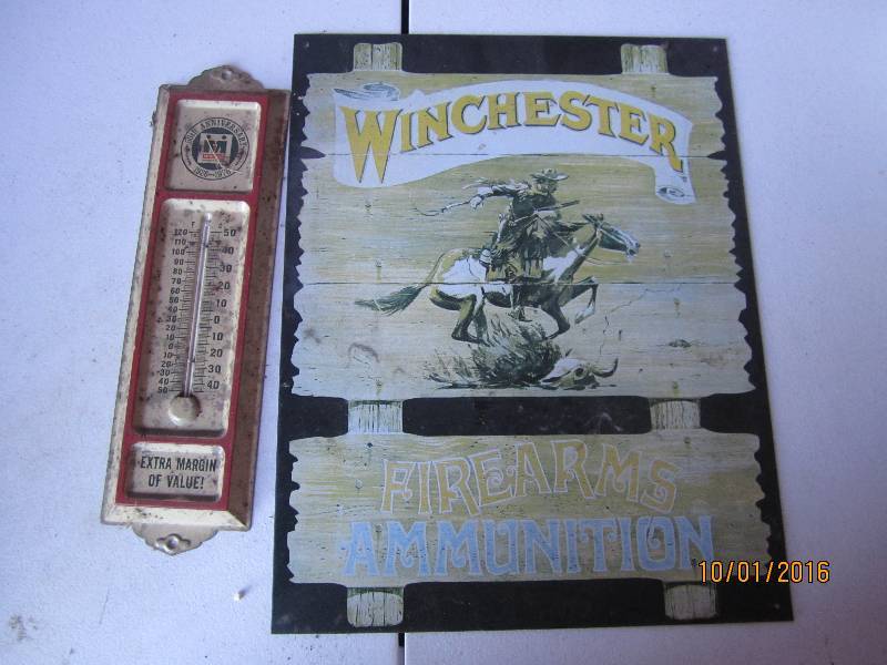 Vintage metal winchester sign and t...