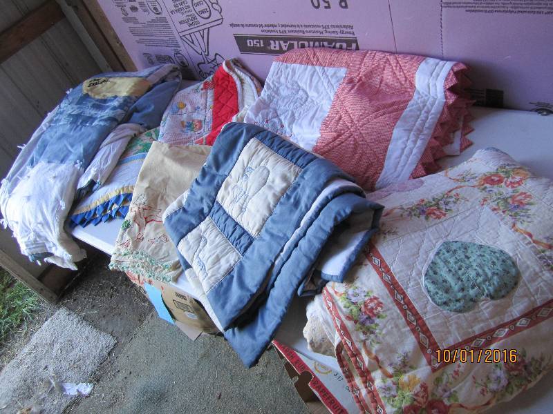 Lot of quilts and ma and pa pillow ...