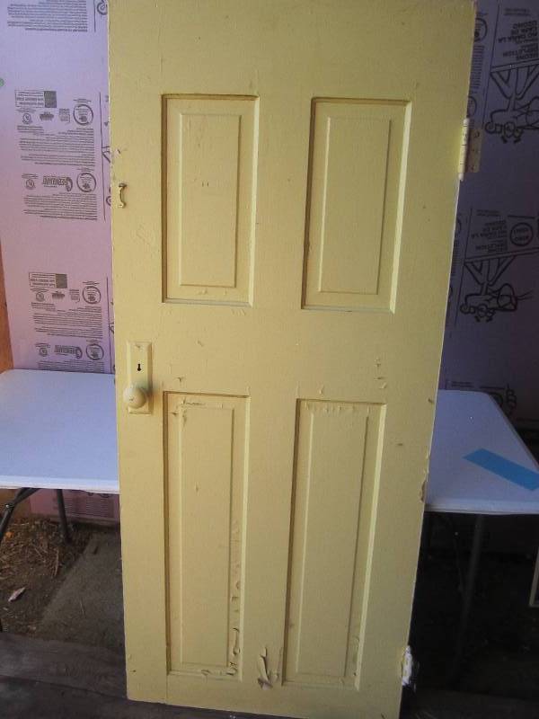 Reclaimed door with handle and hard...