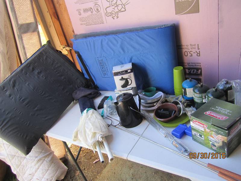Lot of camping gear, umbrella, coff...