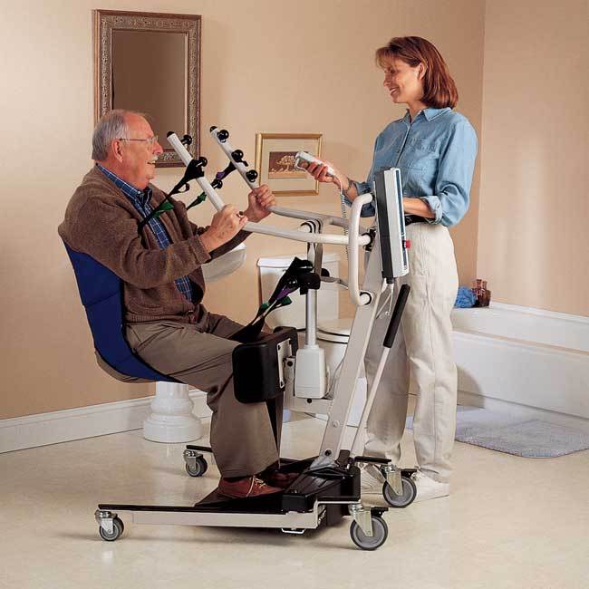 Retails New $4500 Invacare Reliant RPS 350-1 Power Comfortable & Secure Stand-Up Electric Patient Lift With Adjustable Kneepad & Seatstrap 400lb Capacity - Like New Condition - Rarely Used