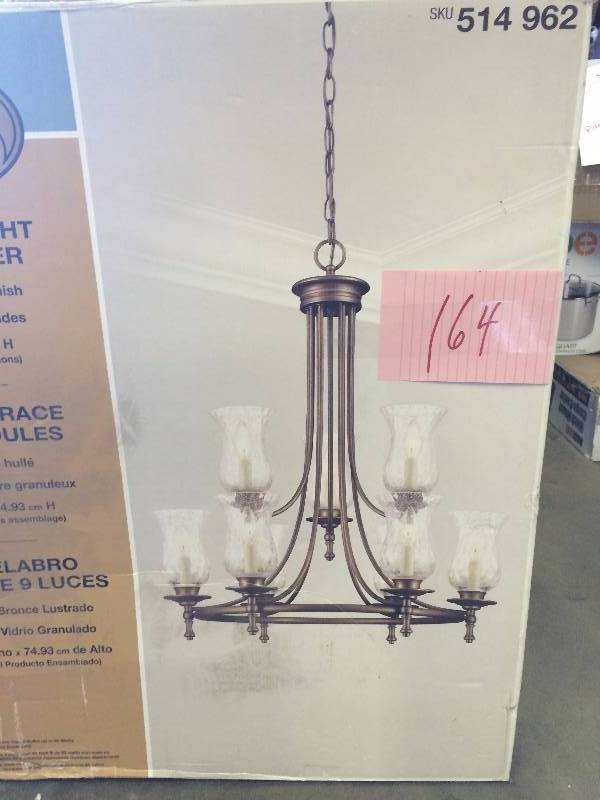 Hampton Bay Grace 9-Light Rubbed Bronze Chandelier Never used actual and stock photos used to diplay item