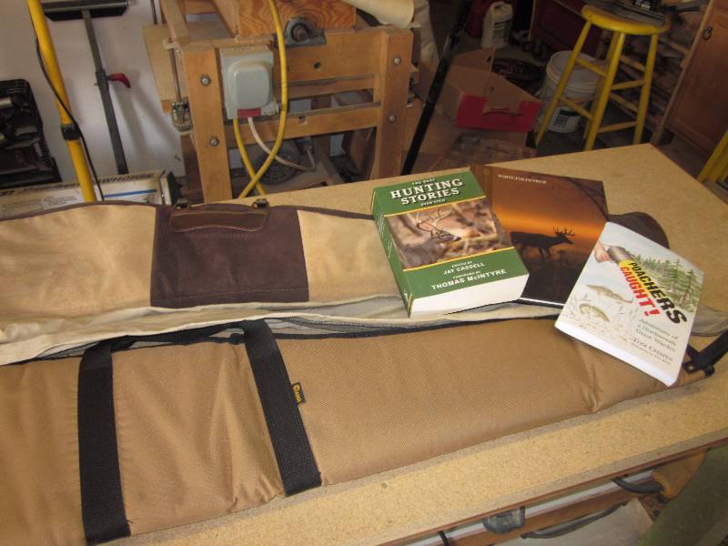 lot 21 image: Gun Cases and 2 boxes of books
