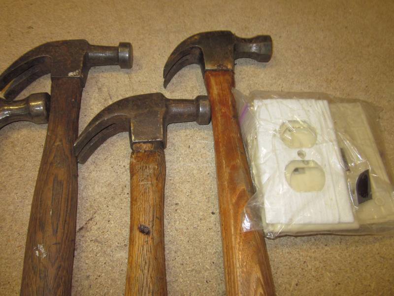 lot 29 image: Tire Rim, 6 Hammers, Oil Filter Wrench, and OutletSwitch Plates