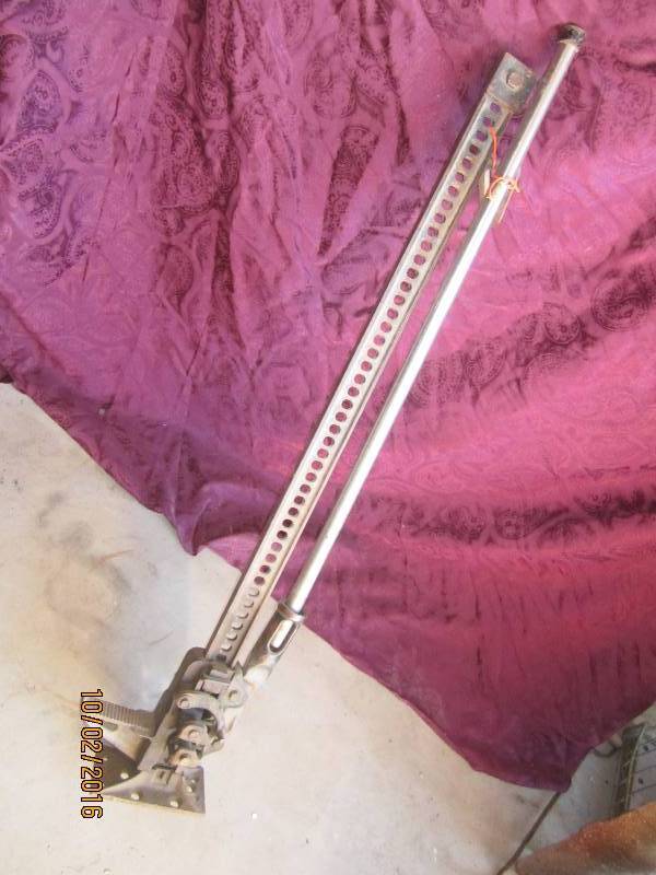 lot 23 image: Antique jack, 4 tall...